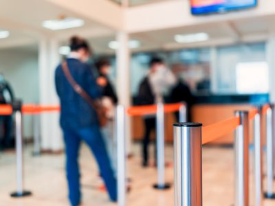 row of people to the bank teller cashier defocused background