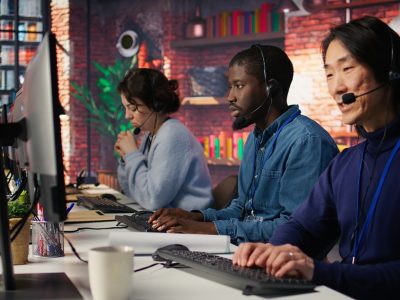 Technical support specialist in call center office using AI LLM chatbot to troubleshoot customer connectivity issue through step by step guidance, using artificial intelligence, camera B